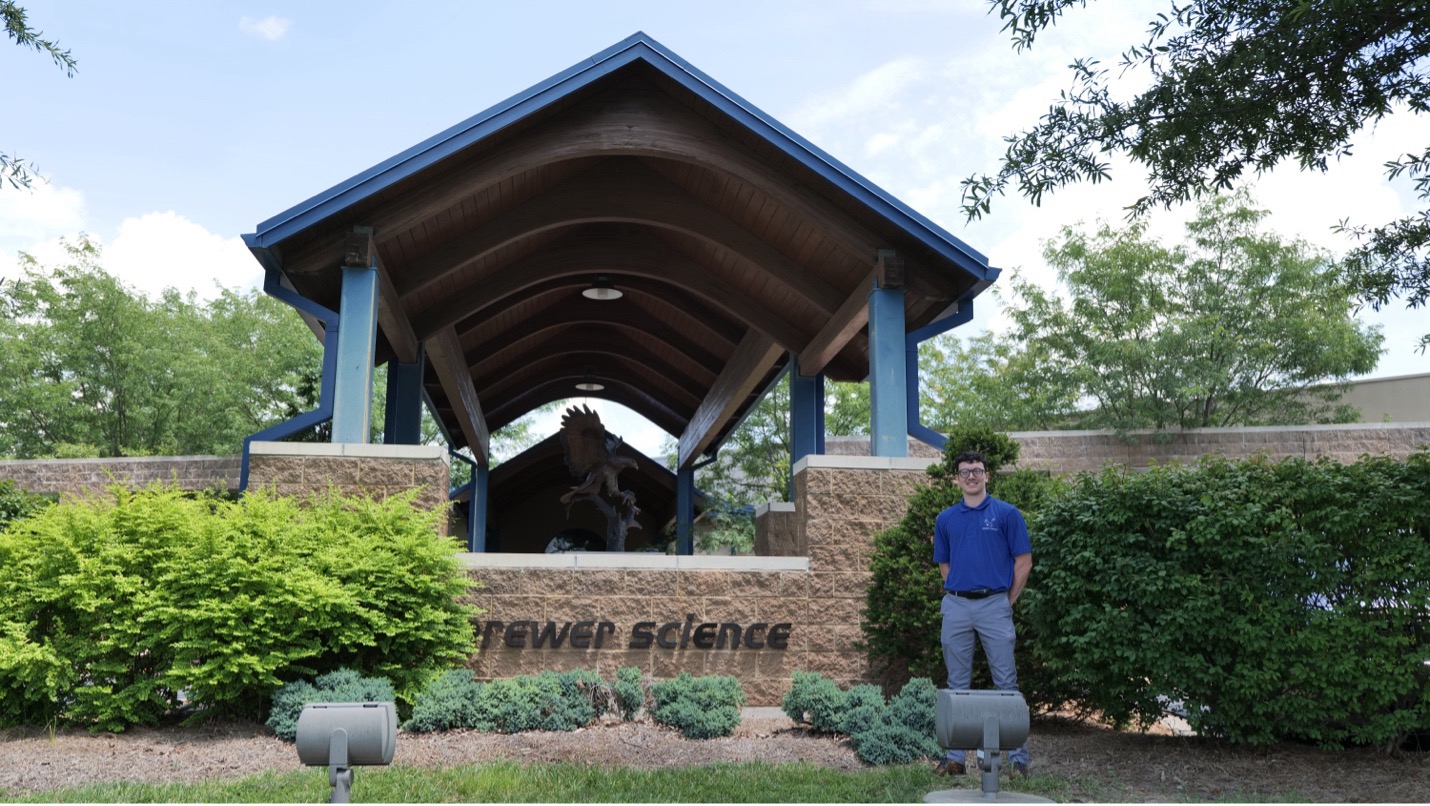 Intern Standing Next to Brewer Science Entrance